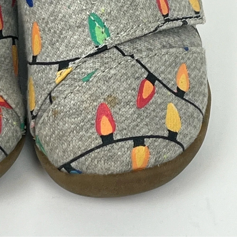 Tom’s Christmas lights print faux shearling lined hard bottom slipper shoes, 6.